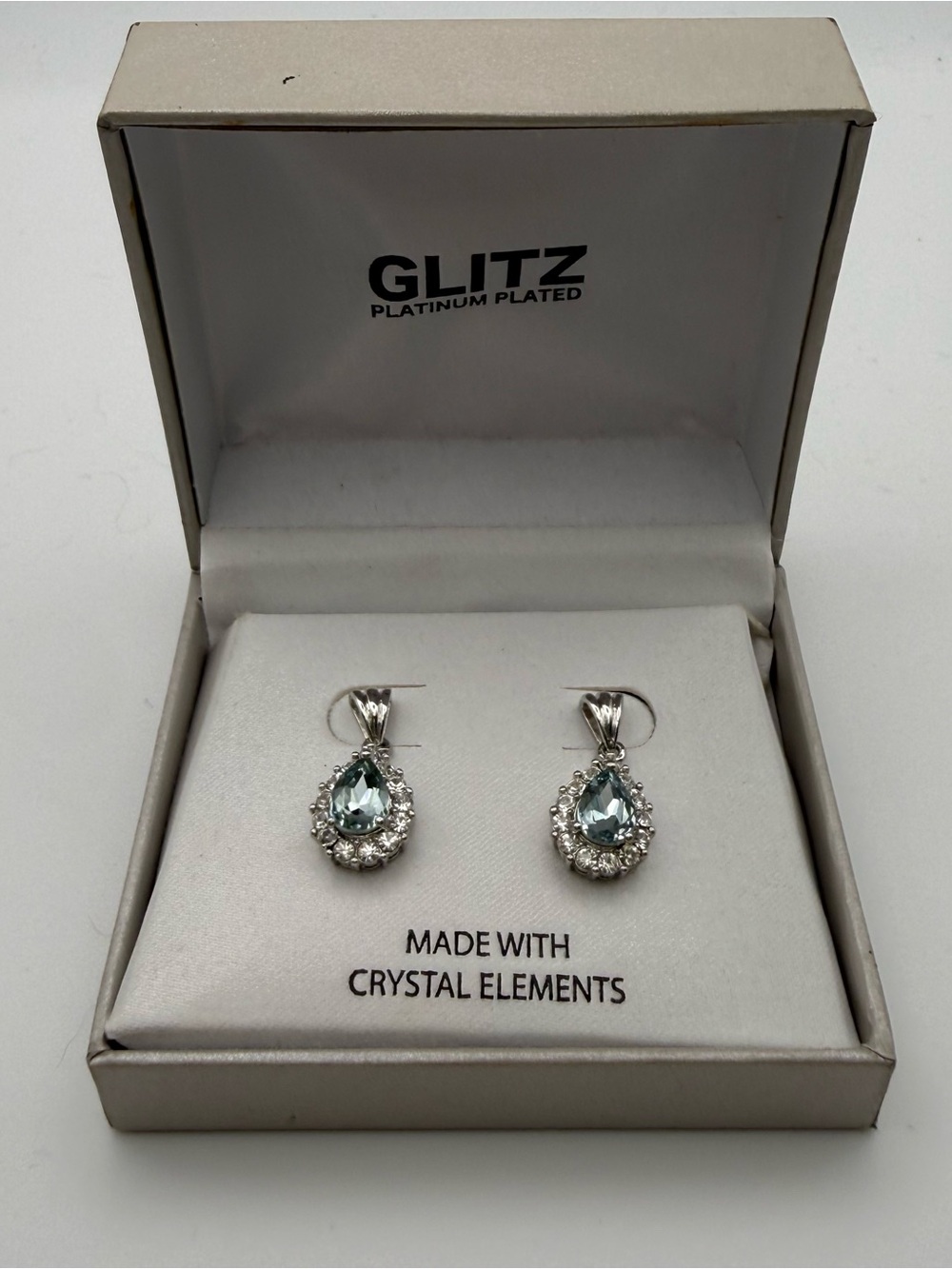 GLITZ Platinum Plated Teardrop Crystal Earrings in Light Blue